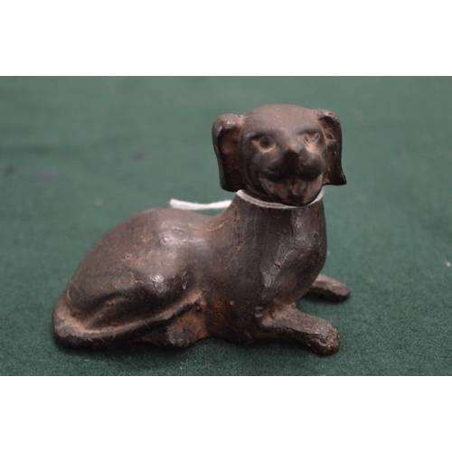 1014 - Small cast iron model of a dog.