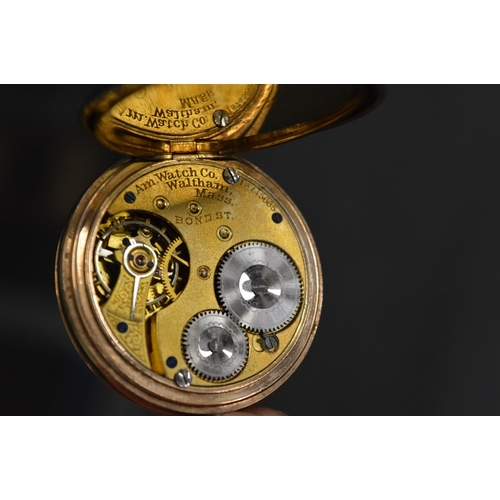 1033 - A Waltham gold plated pocket watch.