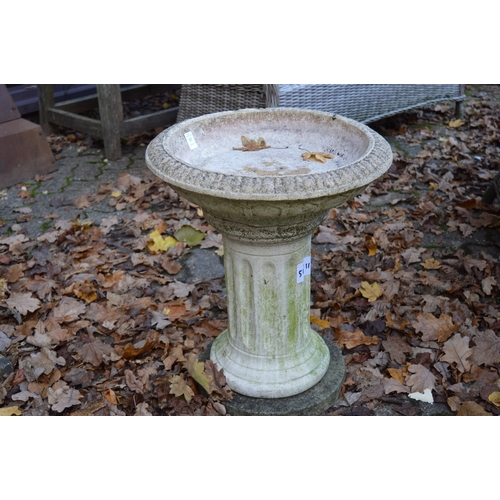 13 - A reconstituted stone circular bird bath.