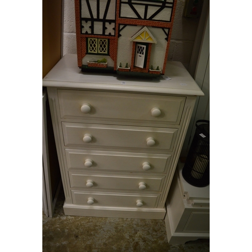 186 - A white painted five drawer chest.