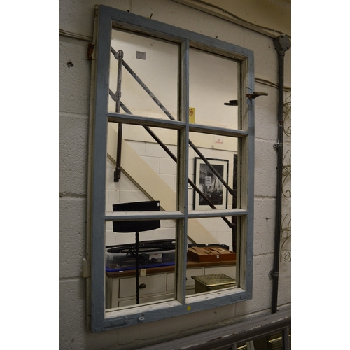 193 - A decoratively painted window style mirror 92cm x 59cm.