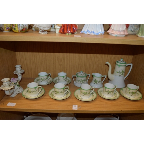 29 - A Noritake coffee service and decorative candelabra.