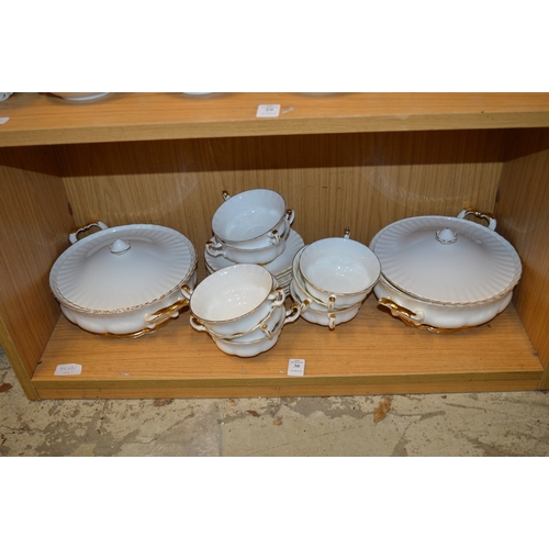 30 - A small quantity of Royal Albert Val D'or dinnerware.