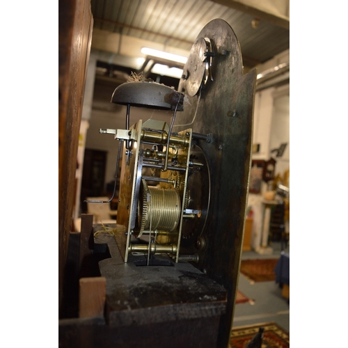 317 - An 18th century oak longcase clock with eight day movement and father time automaton, the arched dia... 