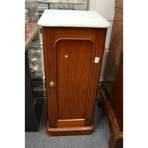 329 - A Victorian mahogany and marble topped pot cupboard.