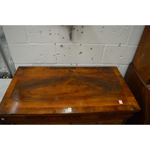 332 - A Georgian walnut and oak straight front chest of drawers, sides cut.