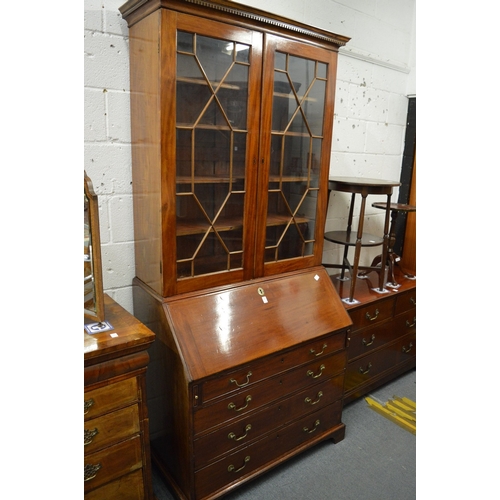 333 - A Georgian mahogany bureau bookcase of typical form.