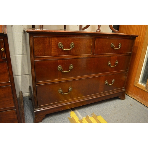 335 - A mahogany straight front chest of drawers.