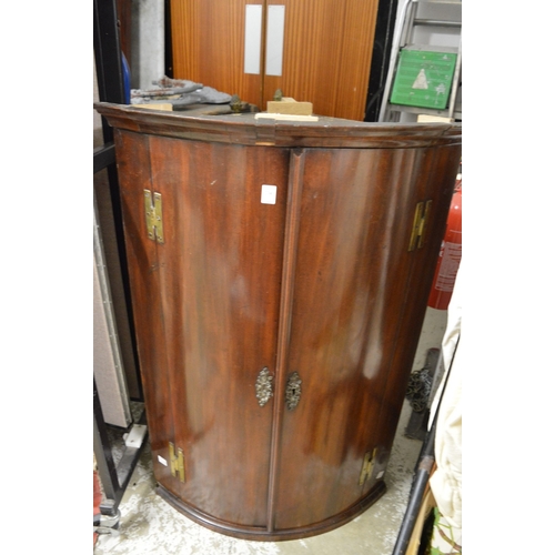 336 - 19th century mahogany hanging bow fronted corner cupboard.