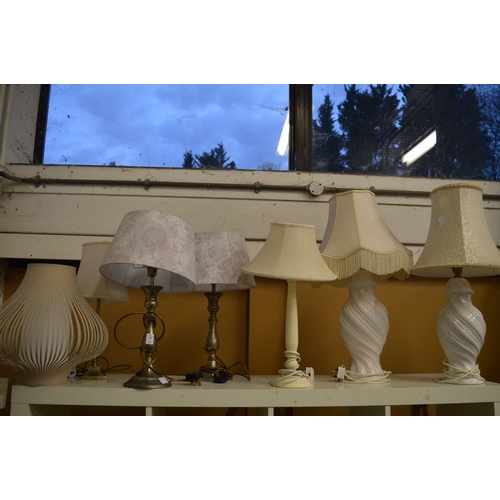 49 - Two pairs of table lamps and three other lamps.