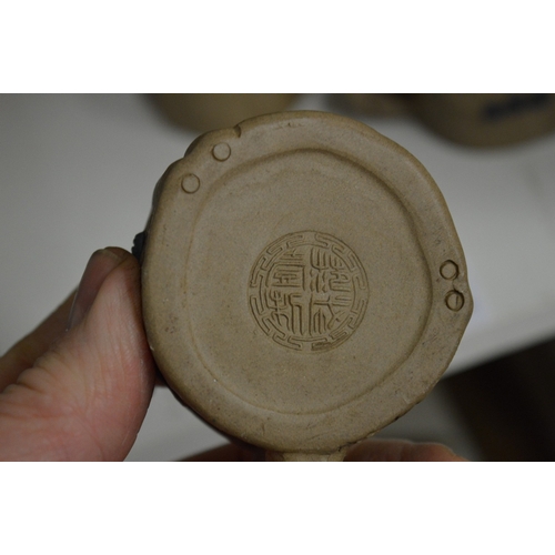 52 - An unusual Chinese Yixing pottery tea service.