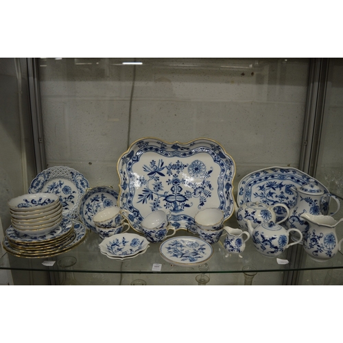 605 - A good comprehensive collection of Meissen onion pattern and other blue and white decorated china.