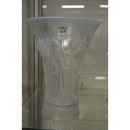 615 - A good large Lalique style opalescent trumpet shaped glass vase moulded with flowers.