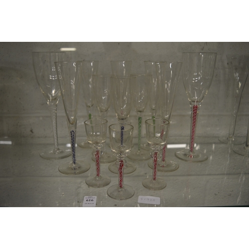 616 - A good collection of modern glassware with colourful air twist stems.