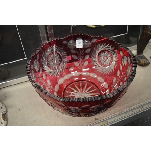 625 - A large Bohemian cut glass and ruby tinted bowl (small rim chip).