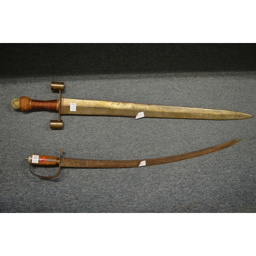 635 - Two decorative swords.