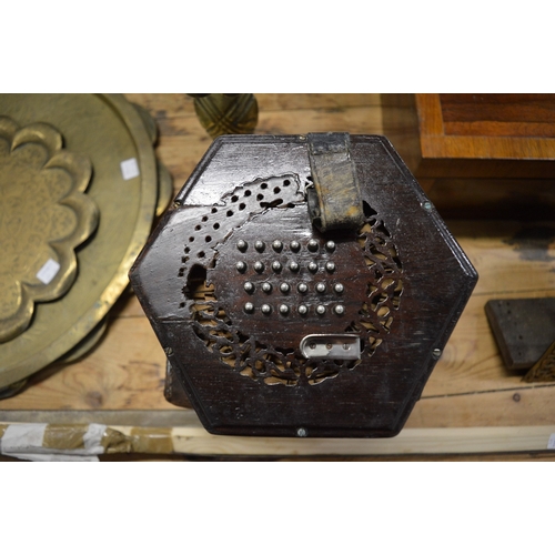 637 - A concertina with original box.