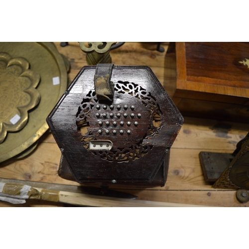 637 - A concertina with original box.