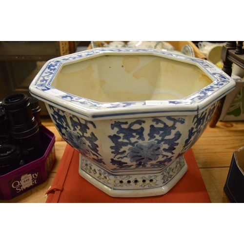 652 - A blue and white octagonal shaped jardiniere together with a box set of reproductions of Hiroshige 1... 