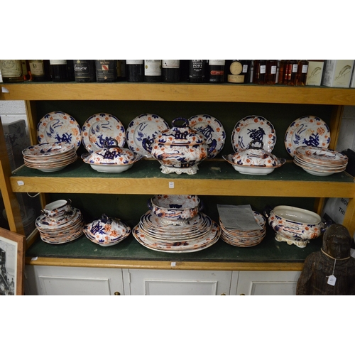 693 - A comprehensive Ironstone dinner service, approx 80 pieces with imari decoration, complete with copy... 