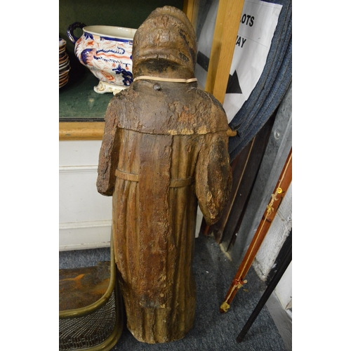 697 - A large early 16th century carved wood figure of a saint.