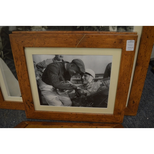 700 - A large photographic print of the racing driver Michael Hawthorn with facsimile signature together w... 