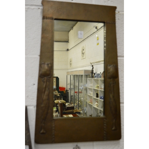 701 - A Liberty & Co Arts and Crafts copper framed mirror.