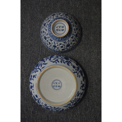 740 - A Chinese blue and white circular bowl painted with birds on a branch together with another blue and... 