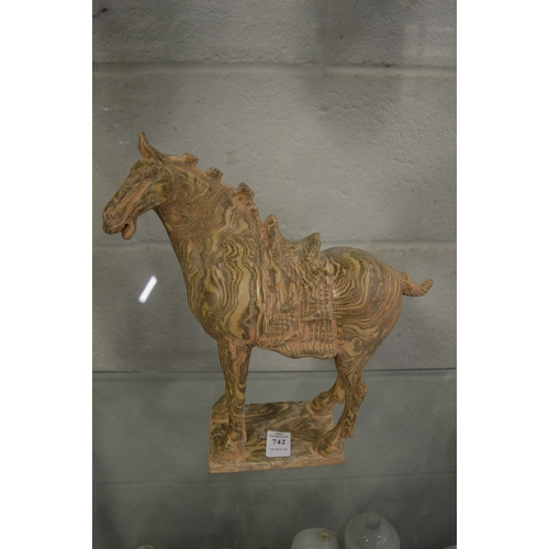 742 - A Tang style terracotta horse with agate glazed decoration.