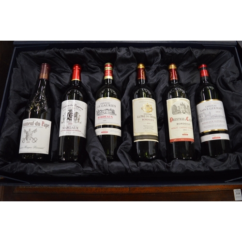 821 - A presentation boxed set of six bottles of French red wine.