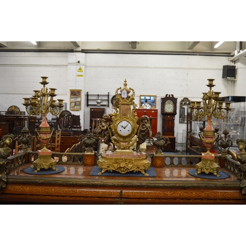 828 - A good large Louis XVI design bronze, ormolu and marble three piece clock garniture, the clock of ly... 