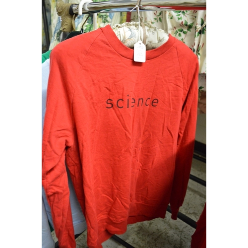 833 - Two Damien Hirst red sweat shirts.