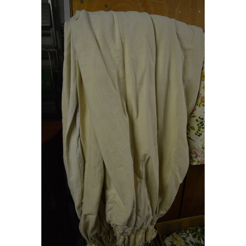 835 - A pair of cream curtains, approx size 110cm wide x 238cm long.