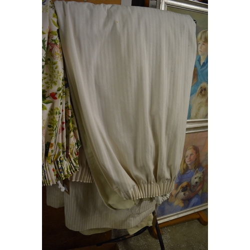 837 - A pair of cream striped curtains, lined, approx size 114cm wide x 195cm long.