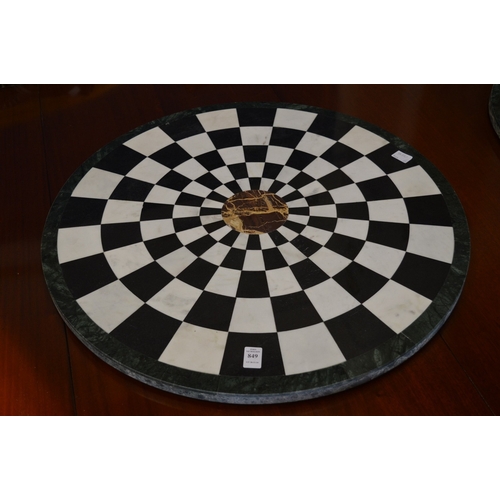 849 - A circular specimen marble table top, 66cm diameter.