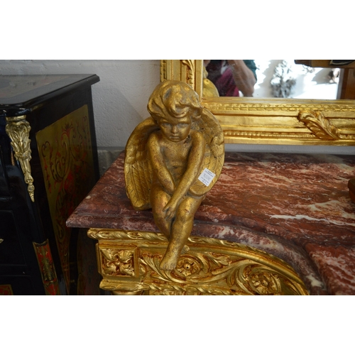 858 - Decorative gilded ornamental items to include column capitals, cherubs and a decorative dish.