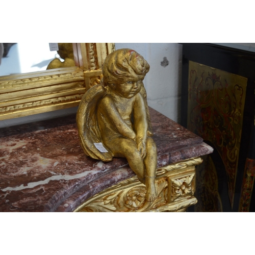 858 - Decorative gilded ornamental items to include column capitals, cherubs and a decorative dish.