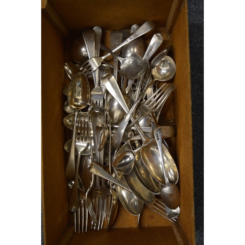 918 - A quantity of silver flatware.