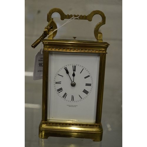 982 - A brass striking carriage clock.