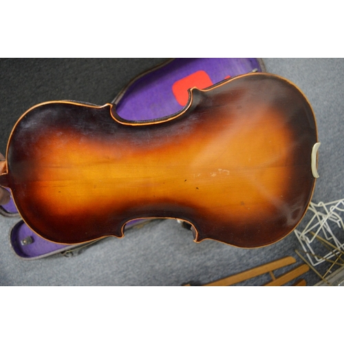 655 - A cased violin.