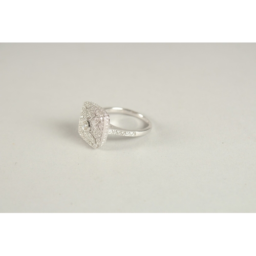 1001 - AM 18CT WHITE GOLD AND DIAMOND ART DECO DESIGN RING, with diamond set bezels and shoulders.