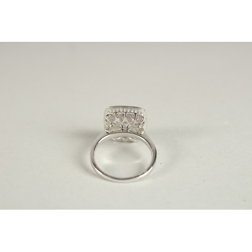 1001 - AM 18CT WHITE GOLD AND DIAMOND ART DECO DESIGN RING, with diamond set bezels and shoulders.