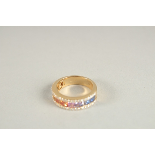 1002 - AN 18CT YELLOW GOLD AND MULTI-COLOURED SAPPHIRE AND DIAMOND HALF HOOP RING.