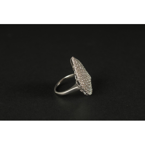 1013 - A LARGE PEAR-SHAPED DIAMOND COCKTAIL RING in 9ct white gold. RBC diamonds 3.15ct.