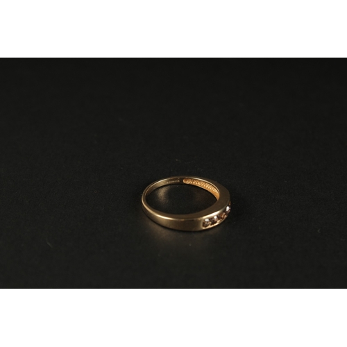 1018 - A 9CT YELLOW GOLD 5-STONE NATURAL CINNAMON DIAMOND RING, channel set. RBC diamonds 0.45ct approx.... 