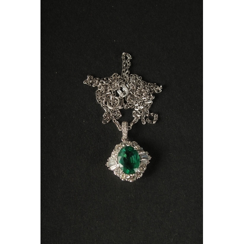 1024 - A CERTIFICATED 18CT WHITE GOLD PENDANT set with oval-cut emerald and a halo of RBC and tapered bague... 