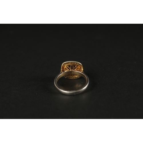 1026 - A SILVER GILT DRESS RING set with a central fancy brown rose-cut cushion-shaped diamond and two halo... 