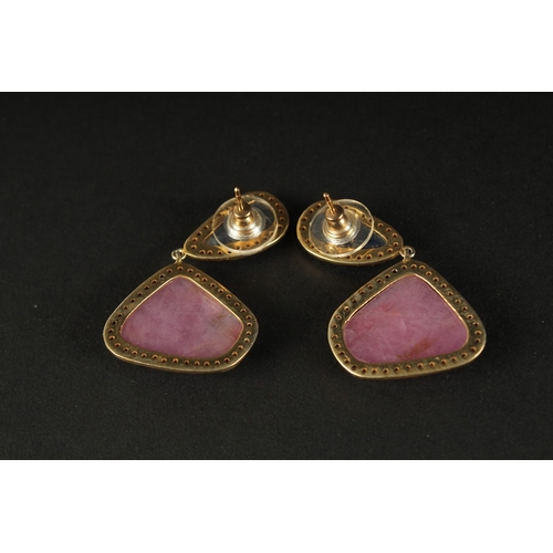 1029 - A PAIR OF UNUSUAL DROP EARRINGS set with large, mixed rose-cut sapphires and rubies with a diamond s... 