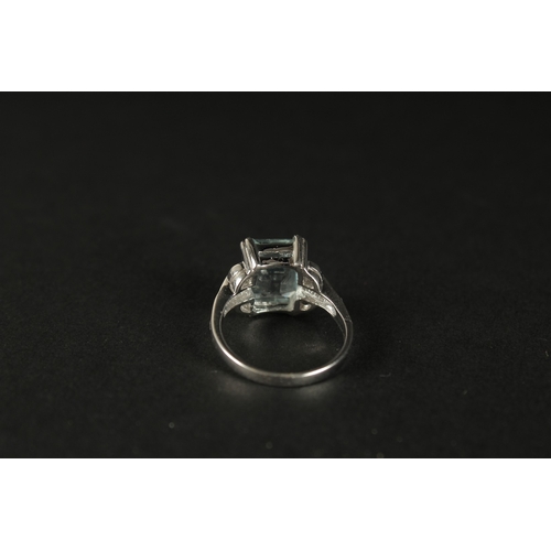 1033 - AN 18CT WHITE GOLD AQUAMARINE AND DIAMOND RING. Emerald cut aquamarine 3.41ct. RBC and baguette diam... 