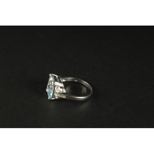 1033 - AN 18CT WHITE GOLD AQUAMARINE AND DIAMOND RING. Emerald cut aquamarine 3.41ct. RBC and baguette diam... 